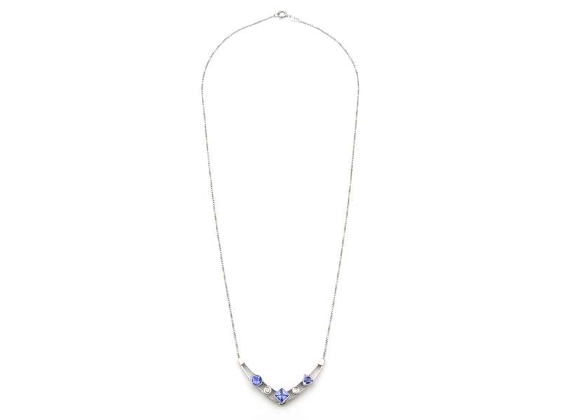 18K gold tanzanite and diamond necklace.