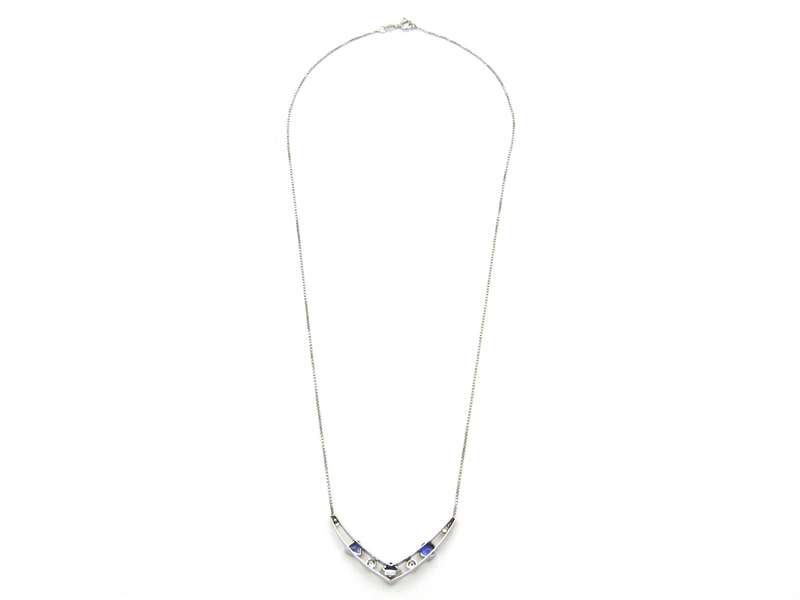 18K gold tanzanite and diamond necklace.