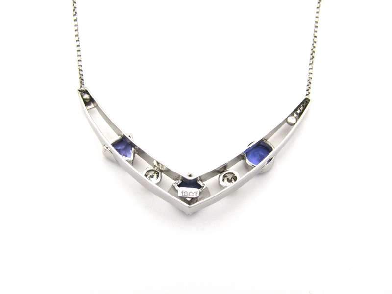 18K gold tanzanite and diamond necklace.
