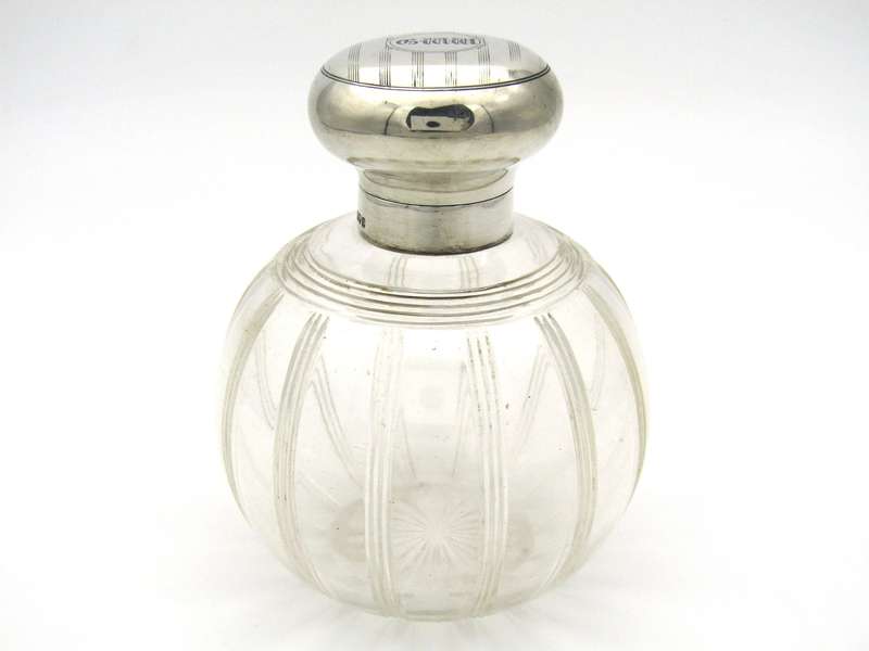 Silver-topped scent bottle by Mappin & Webb, London, 1915.