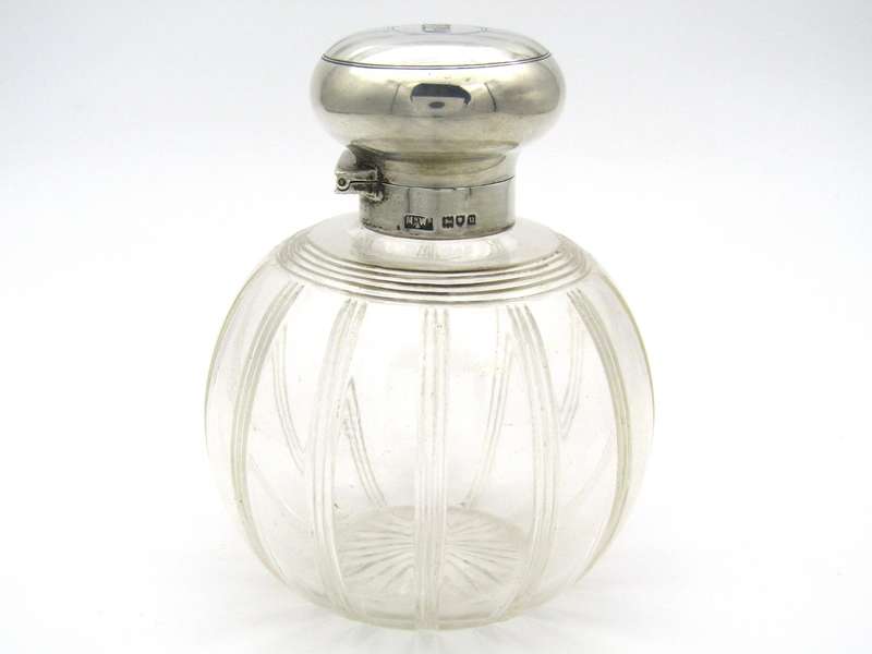 Silver-topped scent bottle by Mappin & Webb, London, 1915.