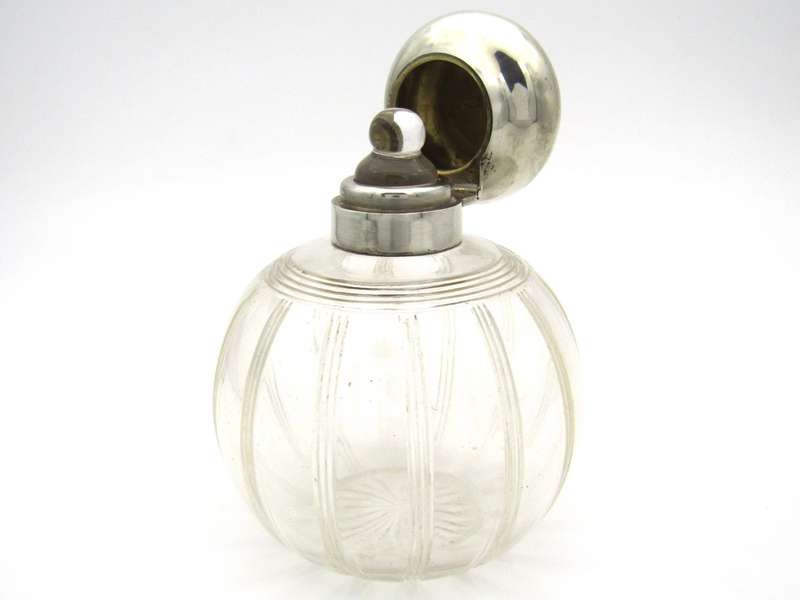 Silver-topped scent bottle by Mappin & Webb, London, 1915.