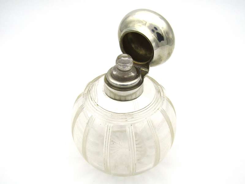 Silver-topped scent bottle by Mappin & Webb, London, 1915.
