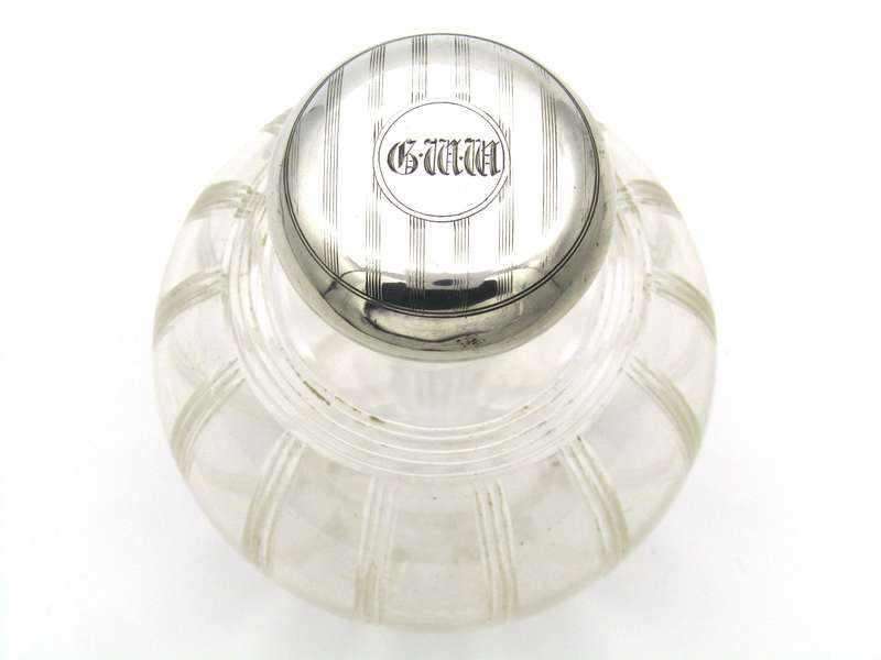 Silver-topped scent bottle by Mappin & Webb, London, 1915.