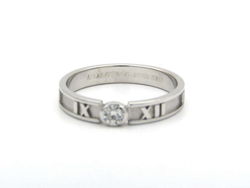 18K gold Tiffany & Co. Atlas diamond ring.