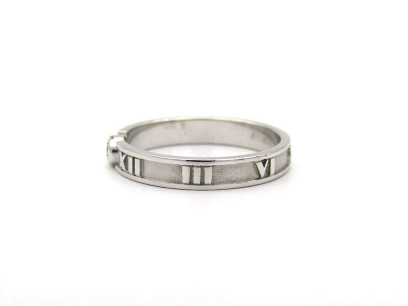 18K gold Tiffany & Co. Atlas diamond ring.
