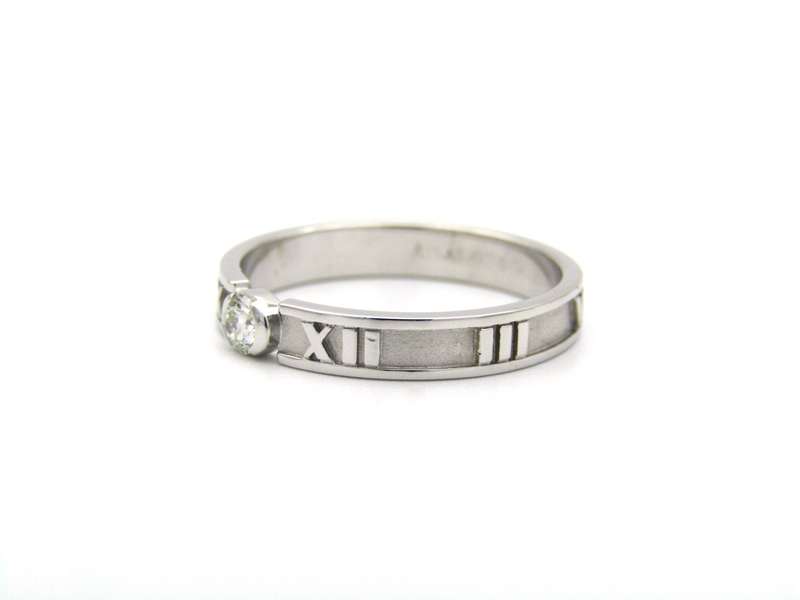 18K gold Tiffany & Co. Atlas diamond ring.