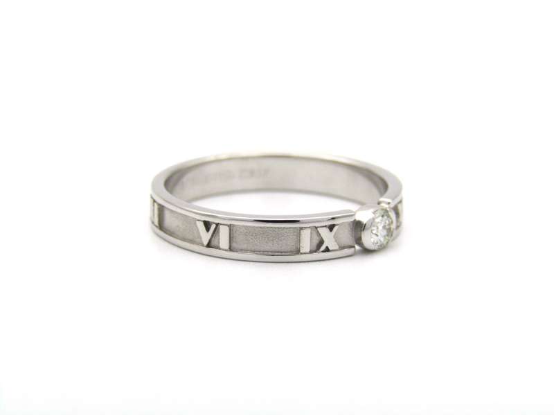 18K gold Tiffany & Co. Atlas diamond ring.