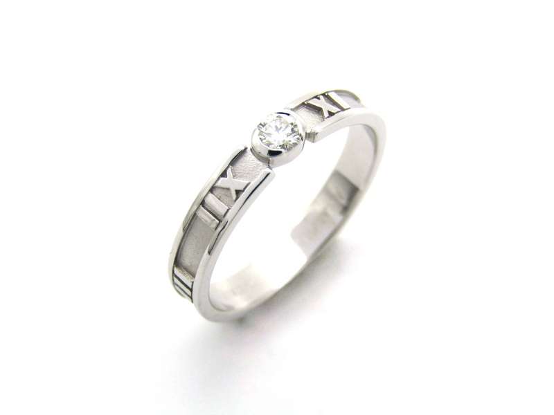 18K gold Tiffany & Co. Atlas diamond ring.