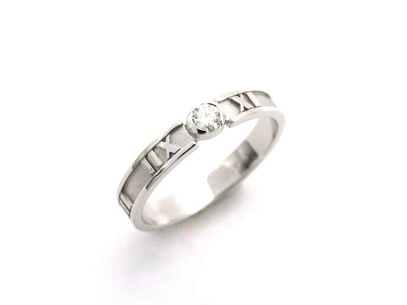 18K gold Tiffany & Co. Atlas diamond ring.