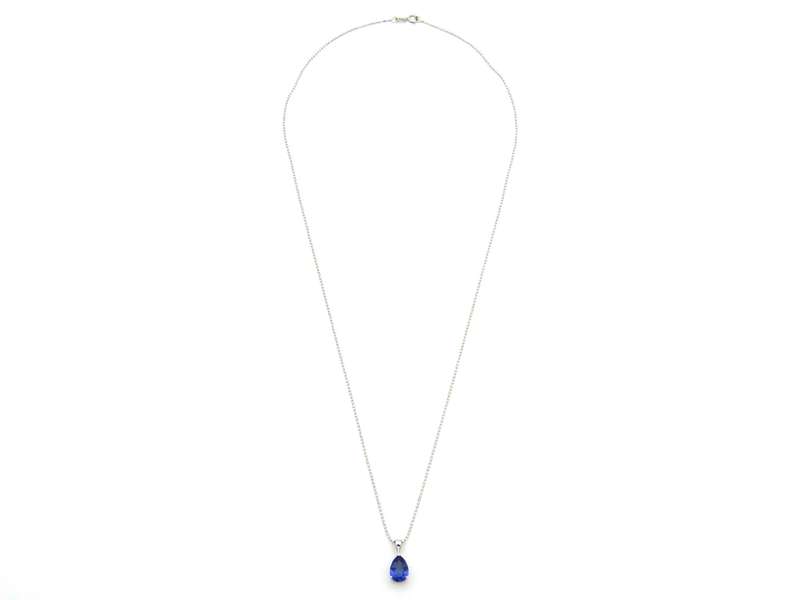 18K gold tanzanite pendant with 18K gold chain.