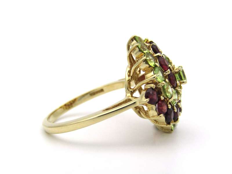 14K gold peridot and ruby ring.