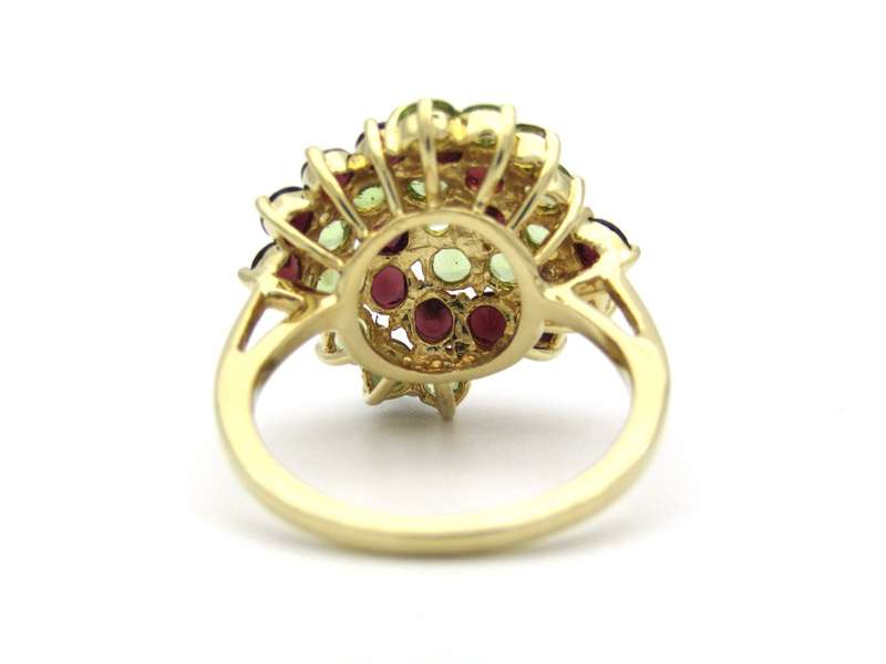 14K gold peridot and ruby ring.