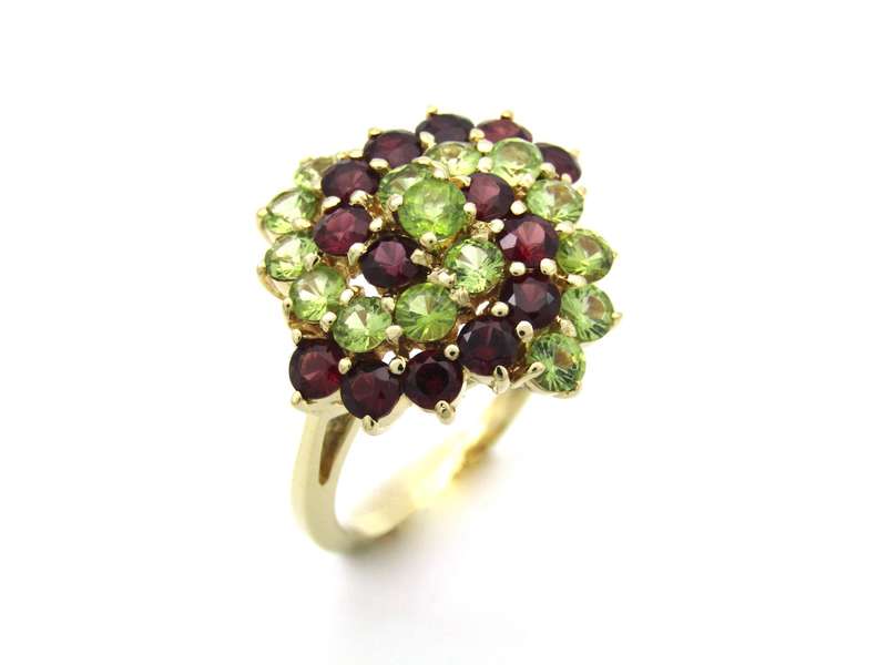 14K gold peridot and ruby ring.