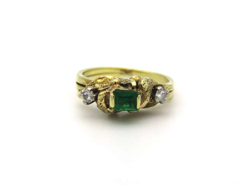 18K gold emerald and diamond ring, circa 1940's.