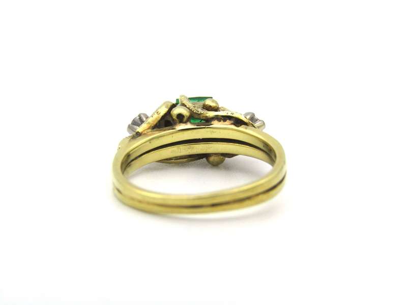 18K gold emerald and diamond ring, circa 1940's.