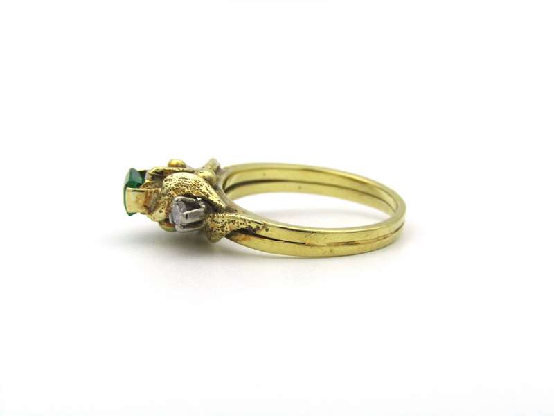 18K gold emerald and diamond ring, circa 1940's.
