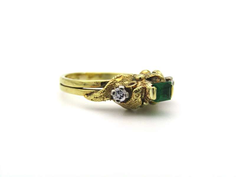 18K gold emerald and diamond ring, circa 1940's.