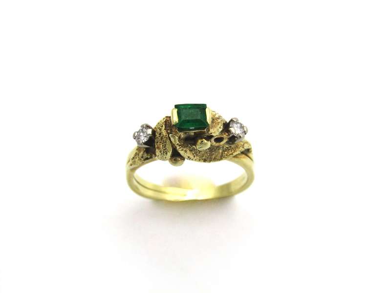 18K gold emerald and diamond ring, circa 1940's.
