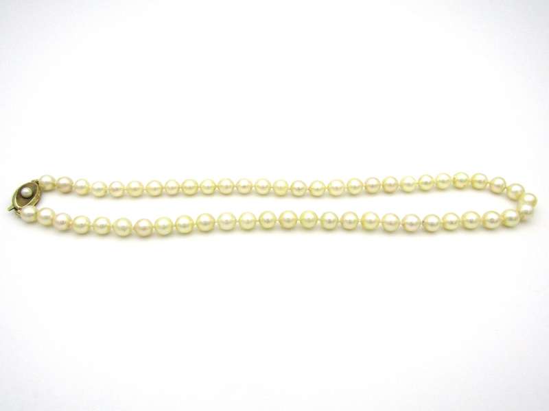 Akoya cultured pearl choker with 9K gold clasp, circa 1950's.