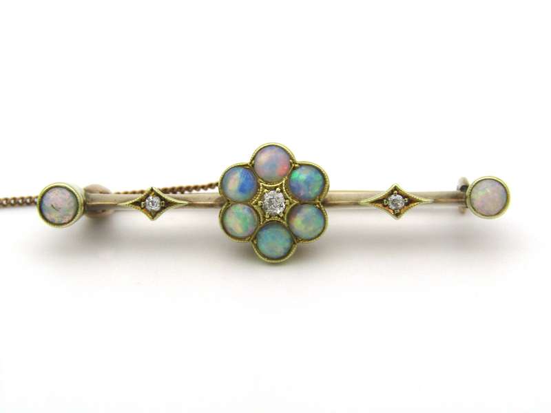 Edwardian 9K gold opal and diamond bar brooch, Circa 1905.
