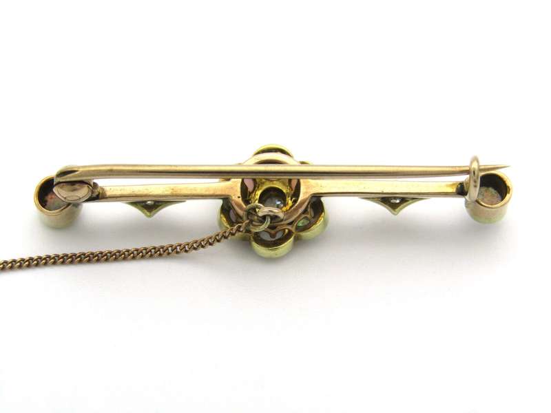 Edwardian 9K gold opal and diamond bar brooch, Circa 1905.