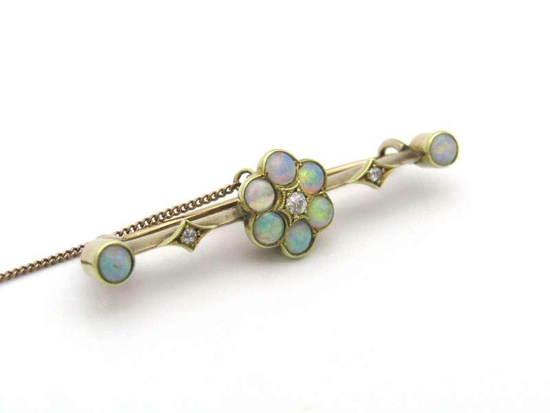 Edwardian 9K gold opal and diamond bar brooch, Circa 1905.