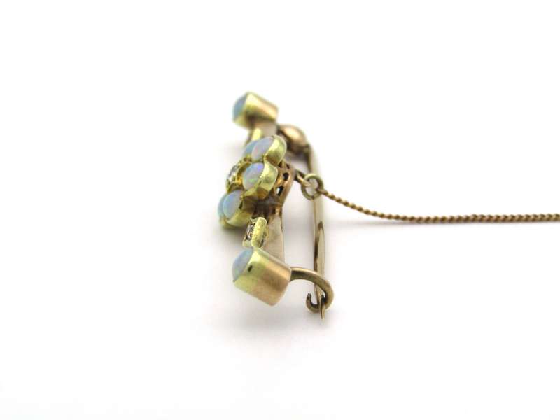 Edwardian 9K gold opal and diamond bar brooch, Circa 1905.