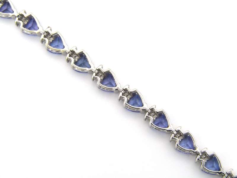 18K gold tanzanite and diamond bracelet.