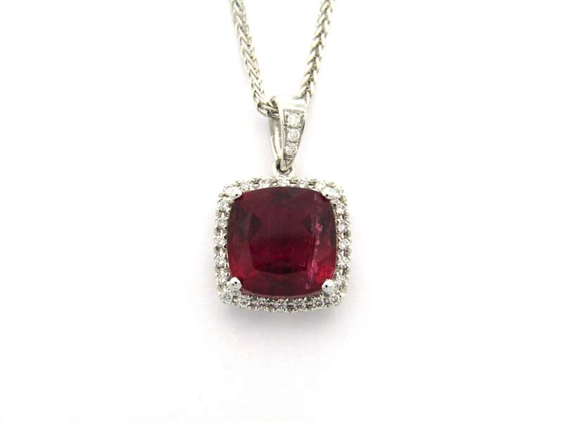 18K gold rubellite tourmaline and diamond pendant by Jack Friedman.