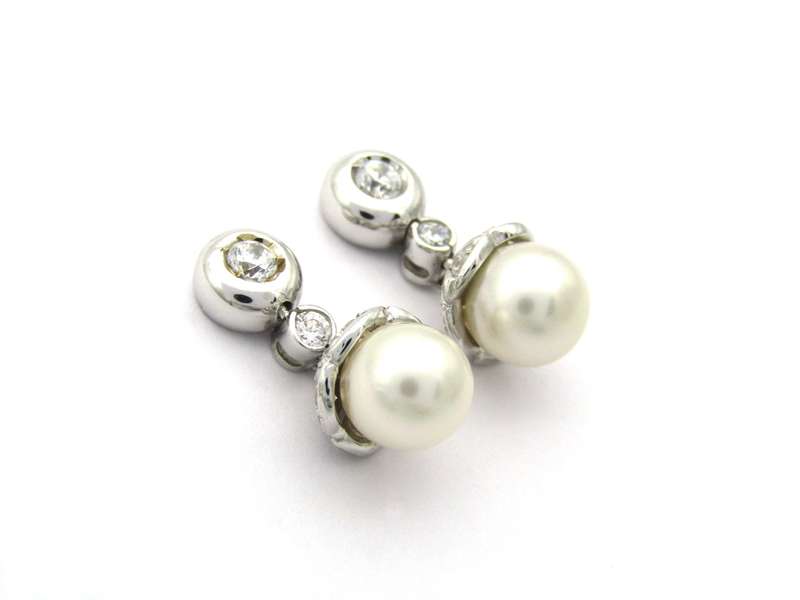 18K gold Akoya pearl and CZ earrings.