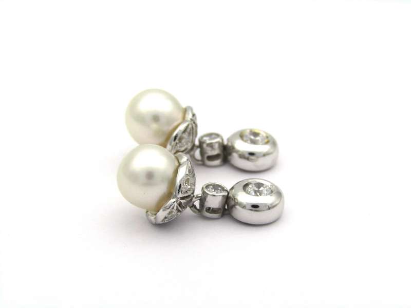 18K gold Akoya pearl and CZ earrings.