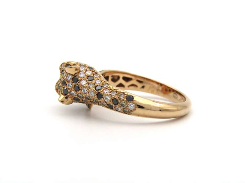 18K gold ruby and diamond leopard ring.