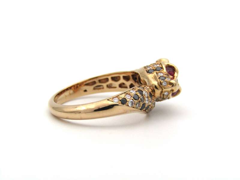18K gold ruby and diamond leopard ring.