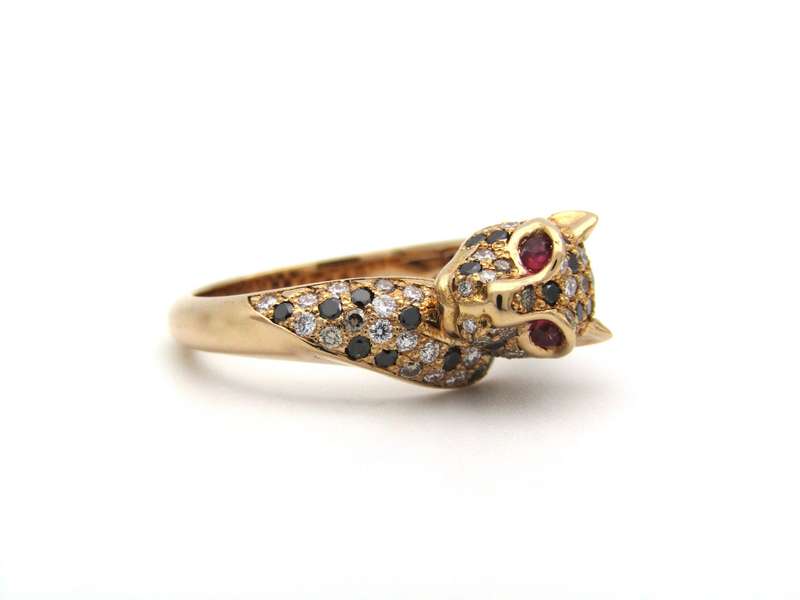 18K gold ruby and diamond leopard ring.