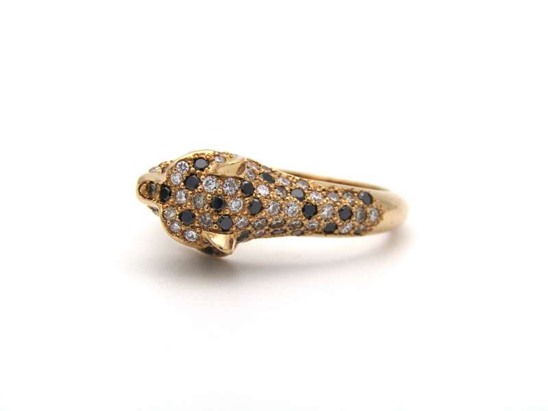 18K gold ruby and diamond leopard ring.