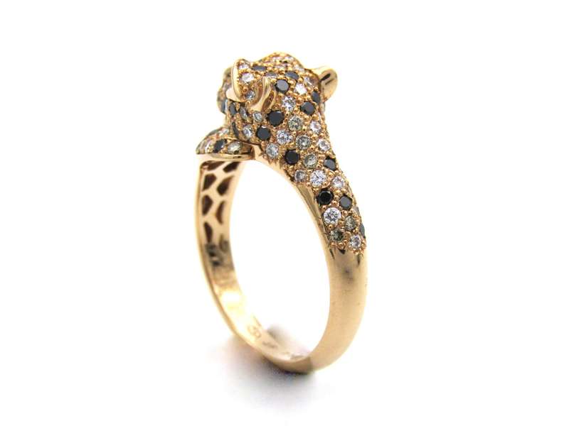 18K gold ruby and diamond leopard ring.