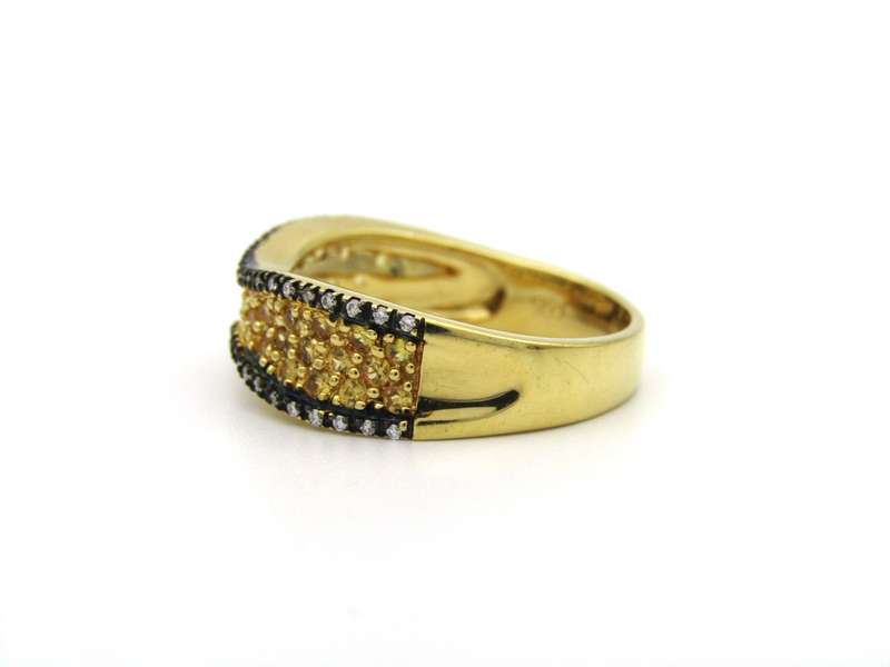 18K gold diamond band ring.