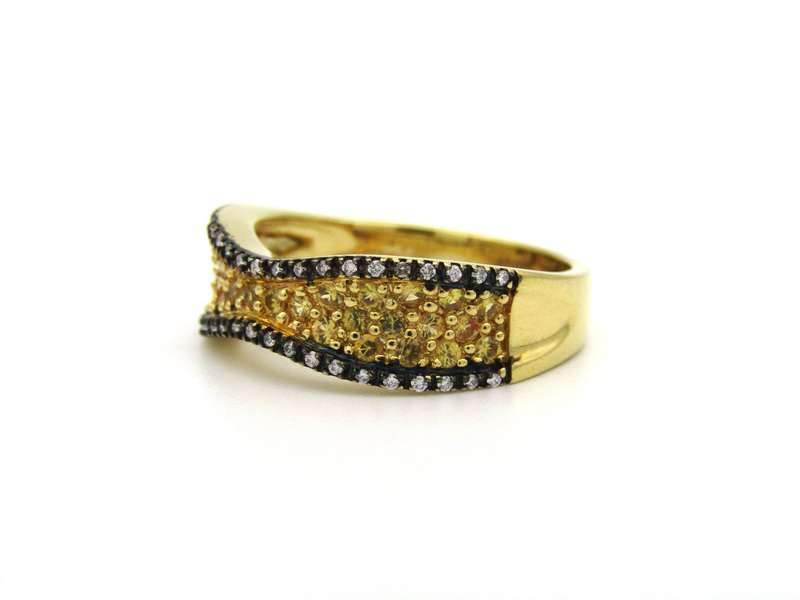 18K gold diamond band ring.