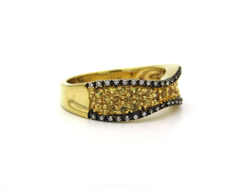 18K gold diamond band ring.