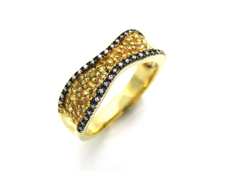 18K gold diamond band ring.