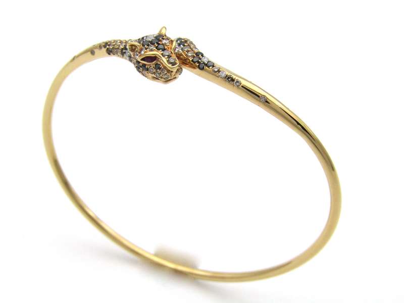 18K gold ruby and diamond leopard bangle.
