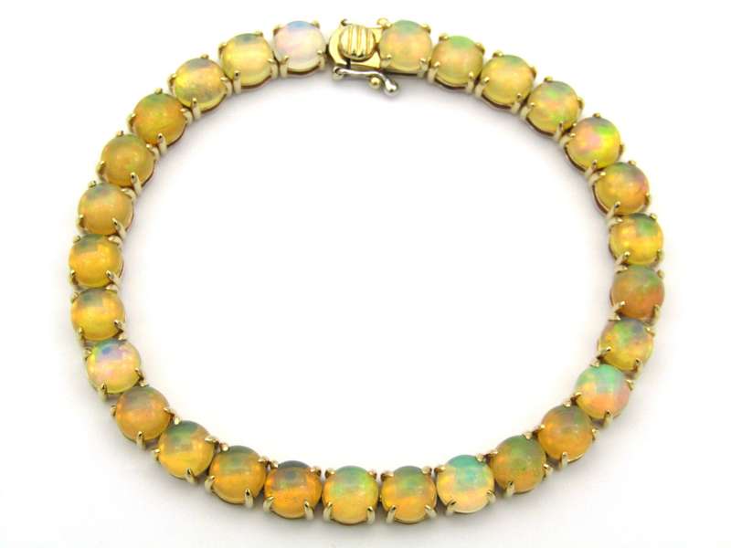 14K gold fire opal bracelet.