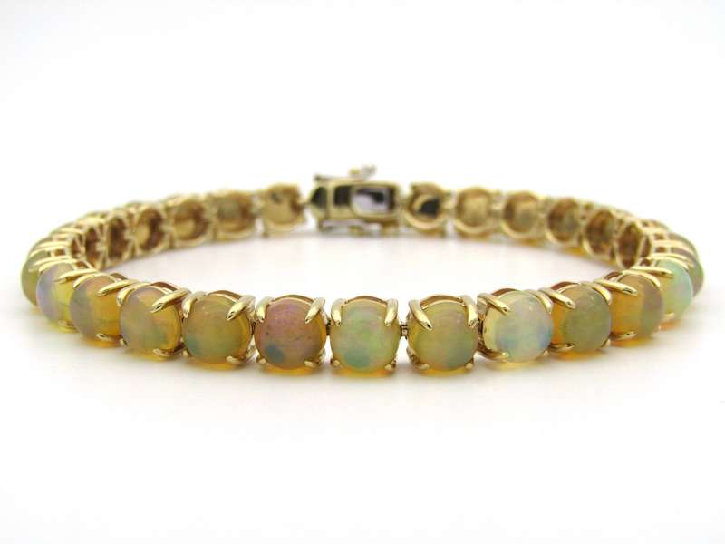 14K gold fire opal bracelet.