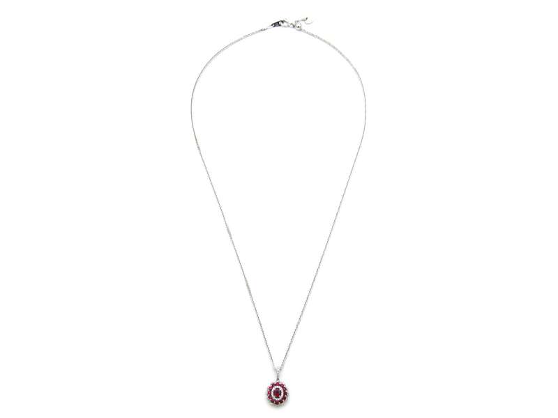 18K gold ruby and diamond pendant.