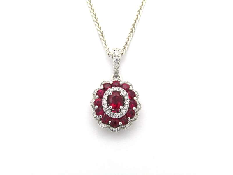 18K gold ruby and diamond pendant.