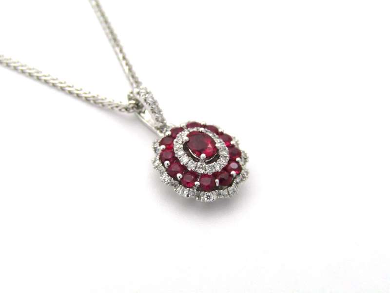 18K gold ruby and diamond pendant.