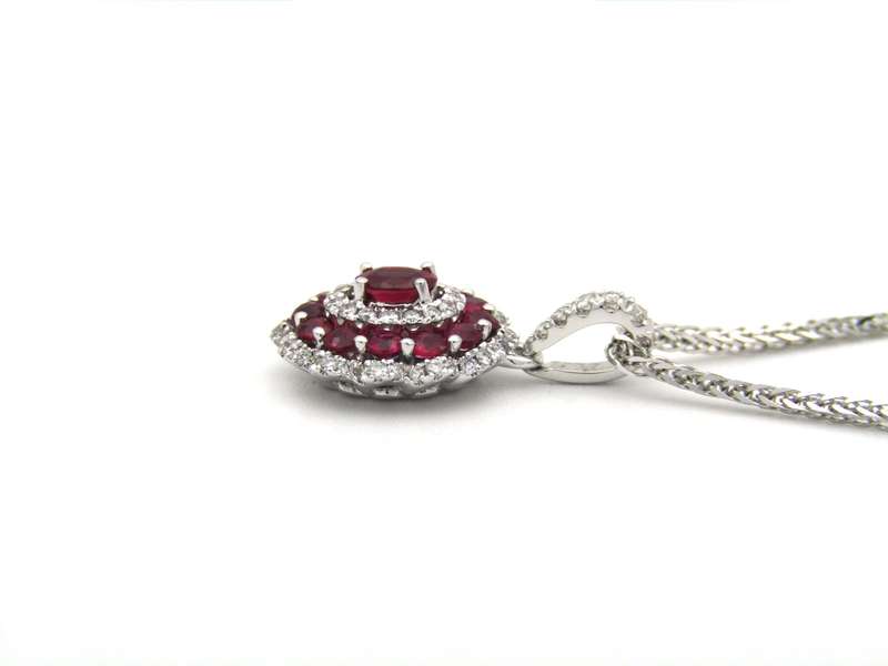 18K gold ruby and diamond pendant.