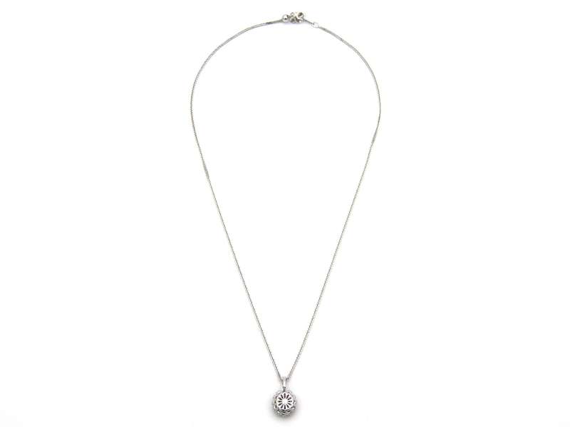 18K gold ruby and diamond pendant.