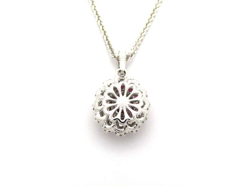 18K gold ruby and diamond pendant.